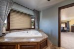 Bathroom attached to Santa Cruz suite, features large jetted soaking tub, there is no toilet in this bathroom